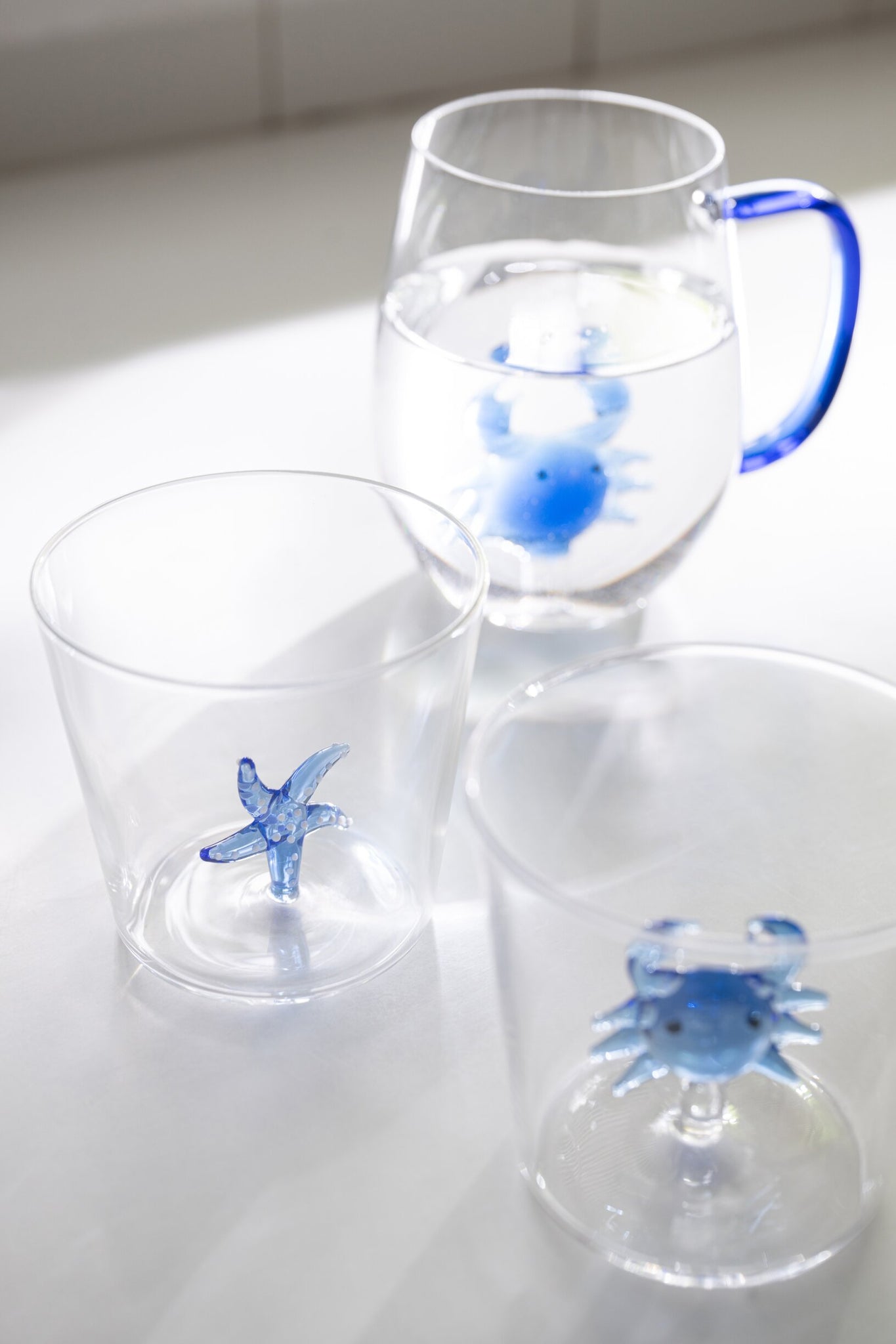 J-Line Verres à eau étoile de mer/crabe avec anse bleus/transparents assortis - 2 pièces