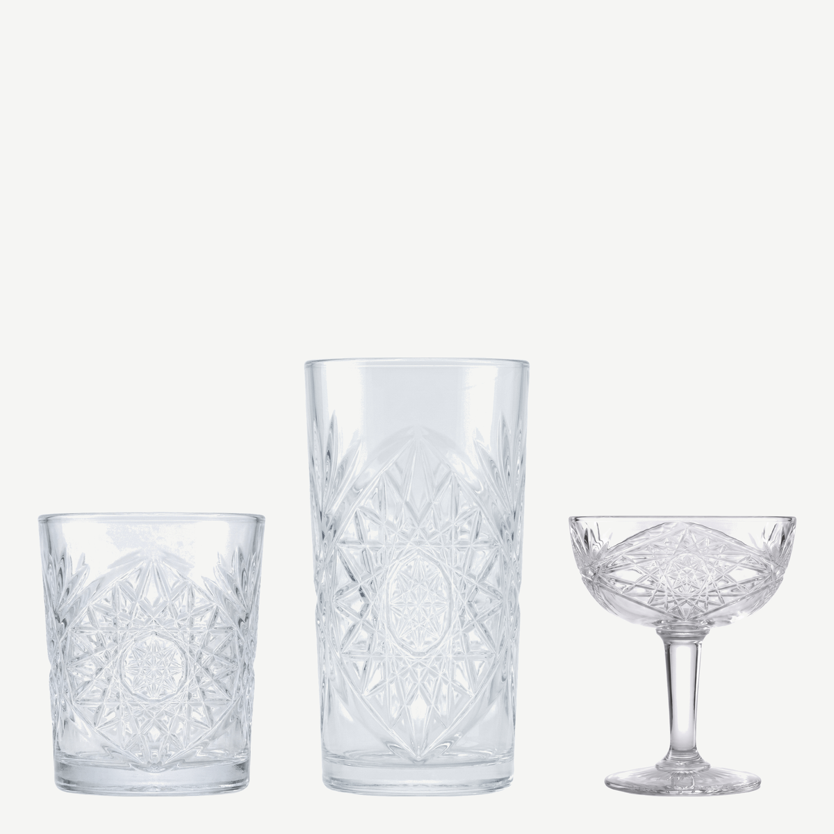 Onis Icon glazenset met lege tumbler, longdrinkglas en champagnecoupe