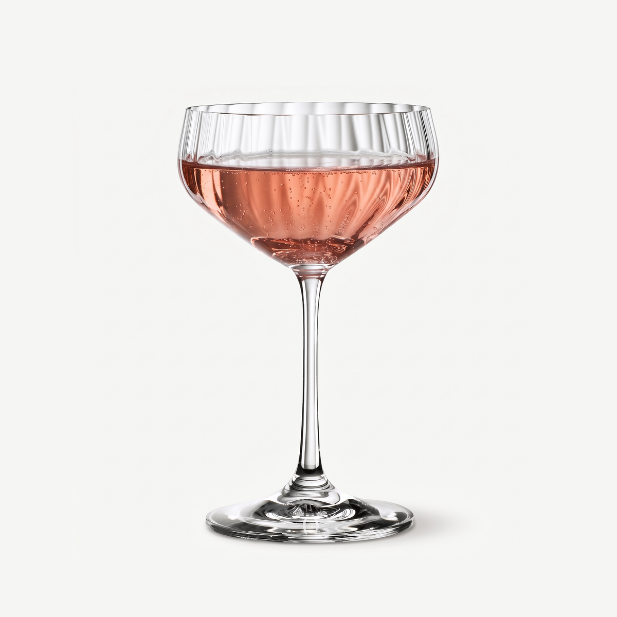 Spiegelau Lifestyle Cocktailglas 31 Cl Coupette gevuld met roze cocktail